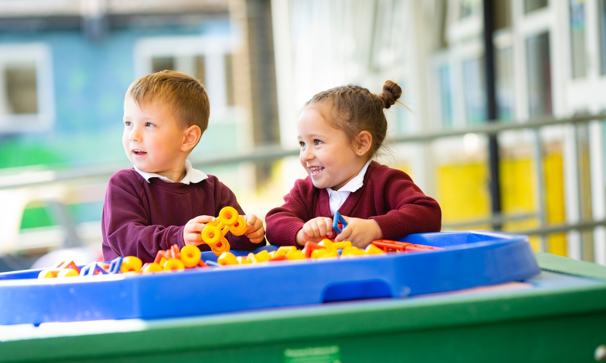 Tudor Academy Two Pupils Playing in the School Grounds Image